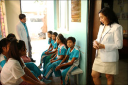 Image of students at the vaccination program for dengue in the Philippines.