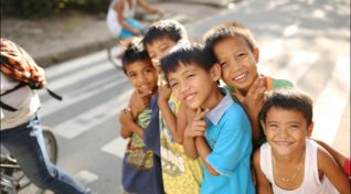 Image, small group of children. Dengue vaccine effectiveness depends on community engagement
