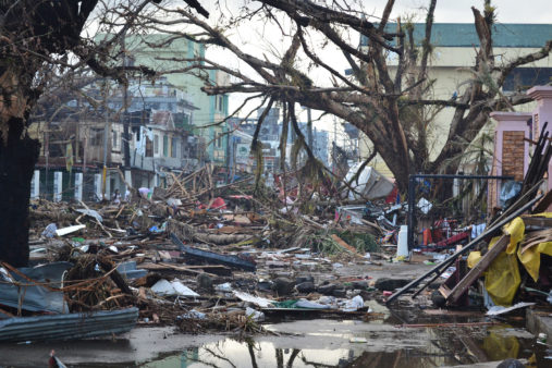 Image shows the natural disaster, Typhoon Haiyan which added to dengue cases in Philippines.