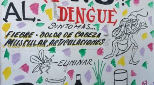 Image of a wall with messages in Mexico for active surveillance for dengue