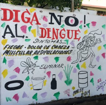 Image of a wall with messages in Mexico for active surveillance for dengue