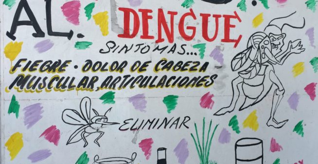 Image of a wall with messages in Mexico for active surveillance for dengue