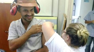 Image: Man get immunized in dengue vaccination campaign in Parana, Brazil.