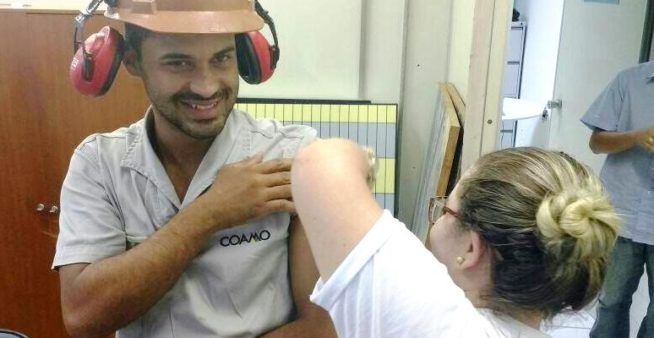 Image: Man get immunized in dengue vaccination campaign in Parana, Brazil.